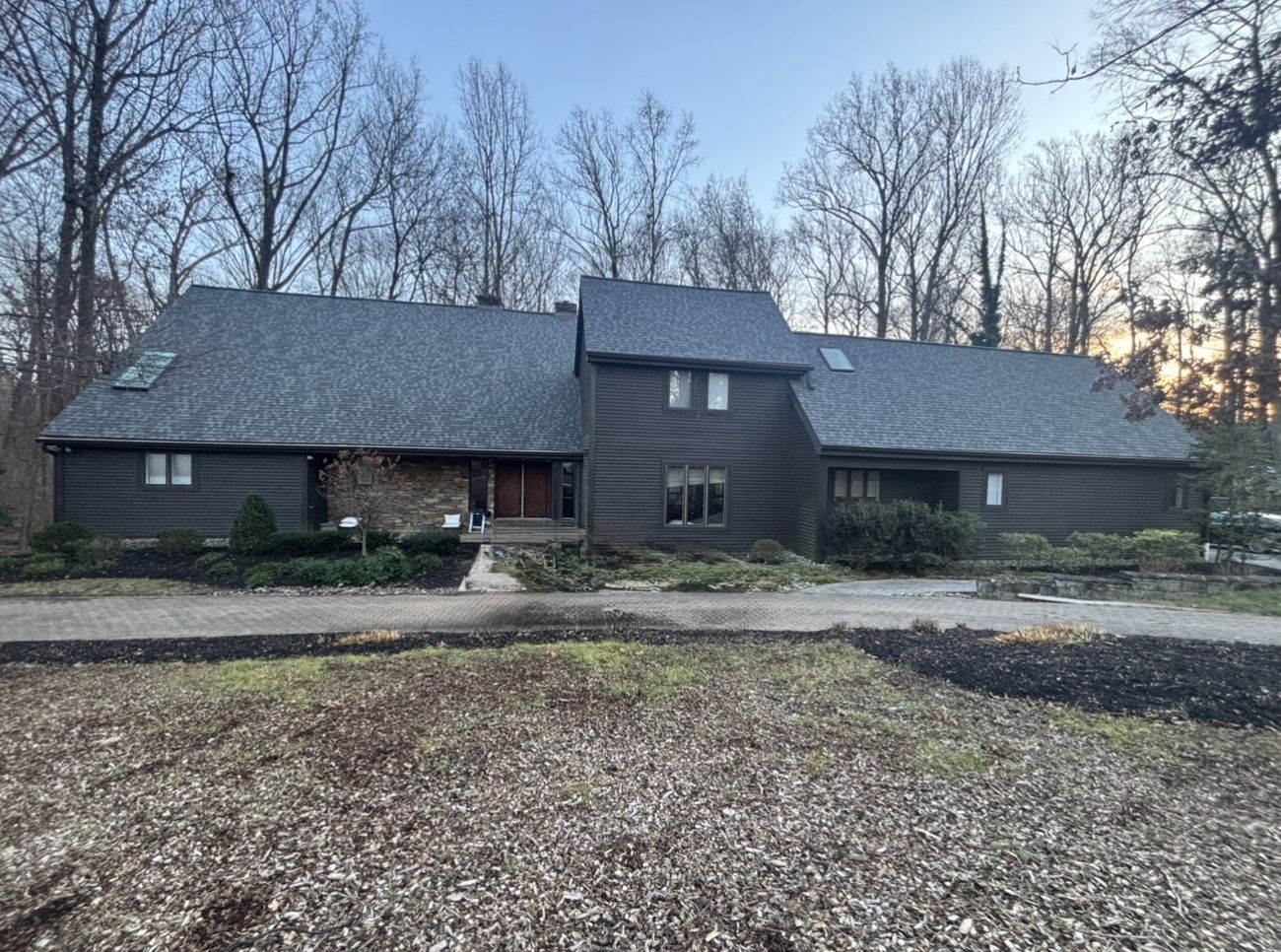 Roofing gutters and skylight replacement 12/12 pitch Maryland